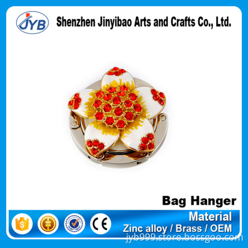 innovative design custom beautiful flower shape bag hanger